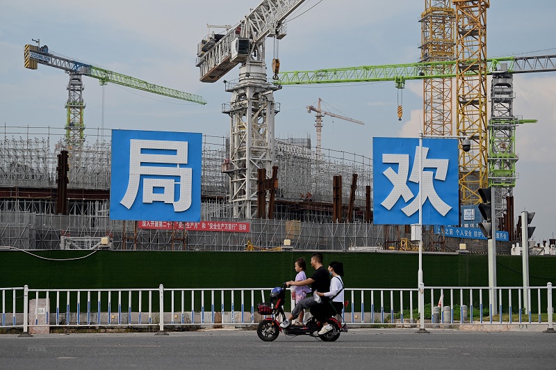 ការដ្ឋាន​សំណង់​មួយ​របស់​ក្រុមហ៊ុន Evergrande Real Estate Group នៅ​ក្នុង​ក្រុង Guangzhou ខេត្ត Guangdong ប្រទេស​ចិន ។ រូបភាព  AFP ។ 
