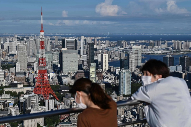 ទិដ្ឋភាពមើលអគារ Tokyo Tower ពីចម្ថាយ  ។ រូបភាព ៖ AFP